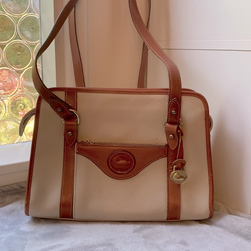 Vintage Dooney and Burke classic shoulder bag in cream and brown leather trim